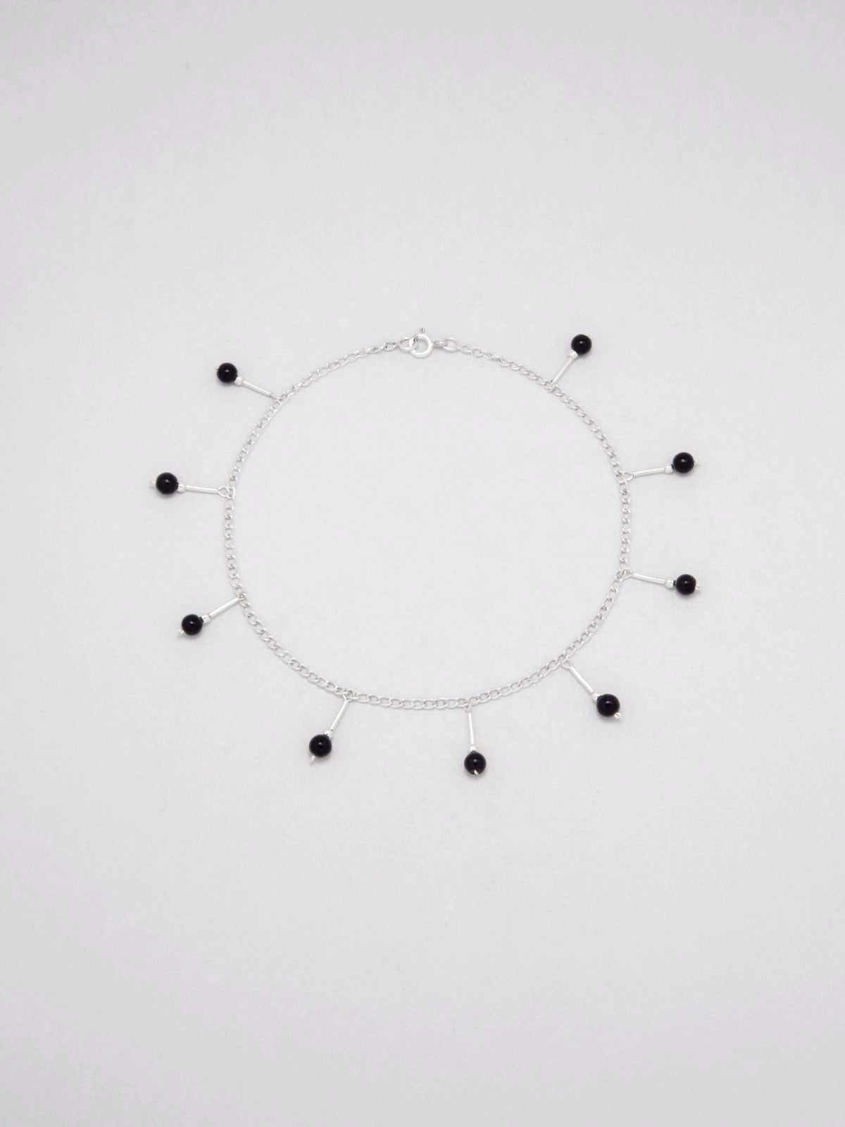 Anklet Sterling silver embellished with color glass.